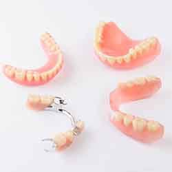 an assortment of different types of dentures