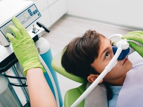 young boy receiving nitrous oxide dental sedation