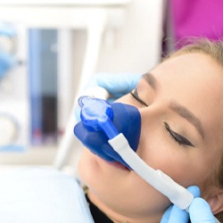 woman receiving nitrous oxide sedation