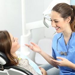 woman talking to her dental hygienist