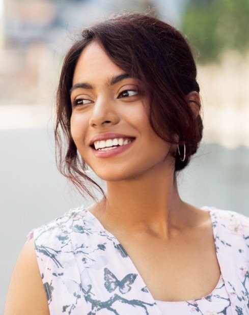 Beautiful woman smiling after sedation dentistry visit