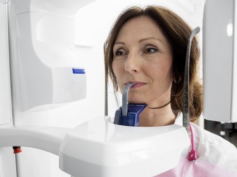 woman receiving dental x-rays