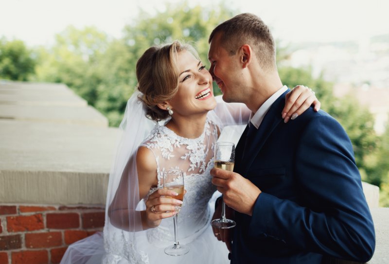 Bride and groom smiling