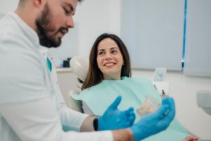 Younger patient at her denture consultation
